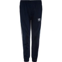 Chinosy chłopięce: adidas Originals PANTS Spodnie treningowe collegiate navy