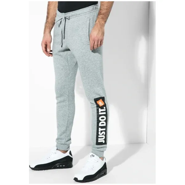 Nike Spodnie M Nsw Jggr Flc Hbr , szary, rozmiar XXL. Szare spodnie męskie Nike, na co dzień, xxl, z napisami, z bawełny. W wyprzedaży za 159,99 zł.