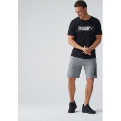 Spodenki Gym & Pilates męskie. Spodenki sportowe męskie Puma, m, bez wzorów, na fitness i siłownię. Za 89,99 zł.
