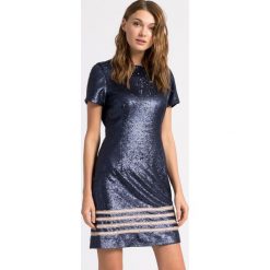 Tommy Hilfiger - Sukienka Gigi Hadid. Niebieskie sukienki damskie TOMMY HILFIGER, na co dzień, s, z haftami, z poliesteru, casualowe, z okrągłym kołnierzem, z krótkim rękawem, krótkie, mini, proste. W wyprzedaży za 459,90 zł.