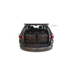 OPEL ASTRA KOMBI ST, 2015- TORBY DO BAGAŻNIKA 5 SZT KJUST - 7031022. Torby podróżne KJUST, bez wzorów, z kauczuku, klasyczne. Za 1329,00 zł.
