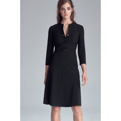 Hit! czarna sukienka zapinana na napy. Czarne sukienki damskie NIFE, na co dzień, na zimę, xl, bez wzorów, z elastanu, biznesowe, bez kołnierzyka, bez rękawów, midi, proste. Za 219,00 zł.