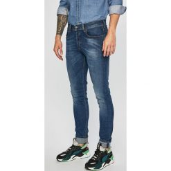 Diesel - Jeansy Sleenker-x. Niebieskie jeansy męskie Diesel, bez wzorów, z obniżonym stanem. Za 649,90 zł.