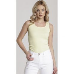 Żółty Top Petokea. Żółte topy damskie Renee, s, bez wzorów, z dzianiny, bez rękawów, na fitness i siłownię. Za 39,99 zł.