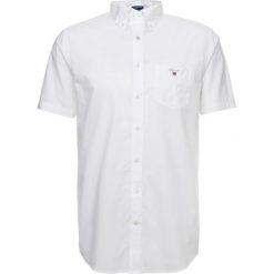 GANT THE BROADCLOTH REGULAR FIT Koszula white. Czerwone koszule męskie marki GANT, l, w kratkę, z bawełny, z klasycznym kołnierzykiem. Za 359,00 zł.