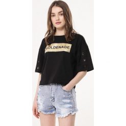 Czarny T-shirt Band. Czarne t-shirty damskie Born2be, m, z nadrukiem, z dzianiny, z okrągłym kołnierzem. Za 34,99 zł.