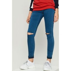 Jeansy skinny z wysokim stanem - Niebieski. Niebieskie spodnie z wysokim stanem Sinsay, z jeansu. Za 49,99 zł.