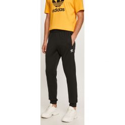 Adidas Originals - Spodnie. Czarne spodnie męskie adidas Originals, na co dzień, s, bez wzorów, z bawełny. Za 229,90 zł.