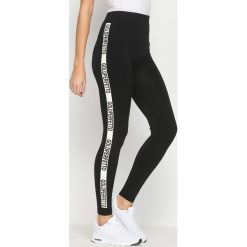 Białe Legginsy Gold Gym. Białe legginsy sportowe damskie marki Born2be, xl. Za 39,99 zł.
