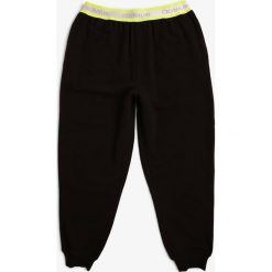 Calvin Klein - Męskie spodnie od piżamy, czarny. Czarne piżamy męskie Calvin Klein, s, bez wzorów, z dresówki. Za 199,95 zł.