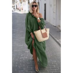 Sukienka PENELOPE KHAKI. Brązowe sukienki damskie Sukienka PENELOPE KHAKI, uniwersalny, bez wzorów, bez kołnierzyka, bez rękawów, długie. W wyprzedaży za 109,00 zł.