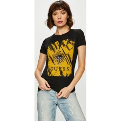 Guess Jeans - Top Daisy. Czarne topy damskie marki Guess Jeans, s, z nadrukiem, z bawełny, z okrągłym kołnierzem. Za 189,90 zł.