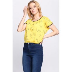 Żółty T-shirt Learn To Love Again. Żółte bluzki damskie Born2be, l. Za 9,99 zł.