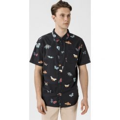 Vans Metamorphosis Koszula Czarny. Czarne koszule męskie Vans, xl, bez wzorów, z bawełny, bez kołnierzyka, z krótkim rękawem. Za 240,95 zł.