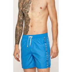 Guess Jeans - Kąpielówki. Pomarańczowe kąpielówki męskie Guess Jeans, s, z nadrukiem, z poliesteru. Za 219,90 zł.