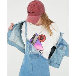 Koszulka z telefonem w stylu retro. Koszulki damskie Pull&Bear, bez wzorów, retro, bez kołnierzyka. Za 34,90 zł.