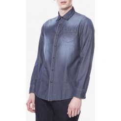 Trussardi Jeans Koszula Niebieski. Niebieskie koszule męskie Trussardi Jeans, bez wzorów, z bawełny, bez kołnierzyka, z długim rękawem. Za 912,95 zł.
