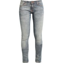 Nudie Jeans SKINNY LIN Jeans Skinny Fit shimmering fall. Niebieskie rurki damskie marki Nudie Jeans, z elastanu. W wyprzedaży za 323,40 zł.