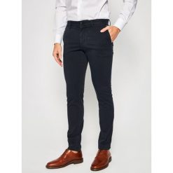 Spodnie materiałowe TOMMY HILFIGER Bleecker MW0MW13287. Niebieskie jeansy męskie TOMMY HILFIGER, m, bez wzorów, z elastanu. W wyprzedaży za 289,00 zł.