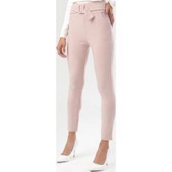Ciemnoróżowe Legginsy Mirasea. Różowe legginsy damskie Born2be, s, bez wzorów. Za 59,99 zł.