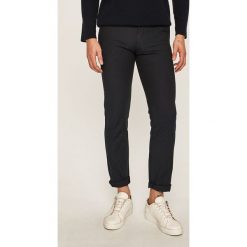 Tommy Hilfiger - Spodnie. Szare spodnie męskie TOMMY HILFIGER, bez wzorów, z bawełny. W wyprzedaży za 299,90 zł.