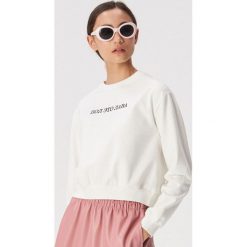Biała bluza z napisem - Kremowy. Białe bluzy damskie Sinsay, s, z napisami, bez rękawów, bez kaptura. Za 39,99 zł.