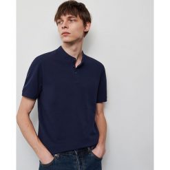 Koszulka polo ze stójką - Granatowy. Niebieskie koszulki męskie Reserved, s, bez wzorów, polo, bez rękawów. Za 49,99 zł.