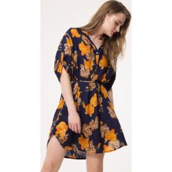 Granatowa Sukienka Undesigning. Niebieskie sukienki damskie Born2be, na lato, xl, w paski, koszulowe. Za 79,99 zł.