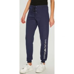 Emporio Armani - Spodnie. Niebieskie spodnie damskie Emporio Armani, s, z nadrukiem, z elastanu, casualowe. W wyprzedaży za 259,90 zł.
