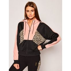 Bluza Puma CHARLOTTE OLYMPIA Co Tsf Track 596759. Różowe bluzy damskie Puma, l, bez wzorów, z bawełny, bez rękawów, bez kaptura. Za 439,99 zł.