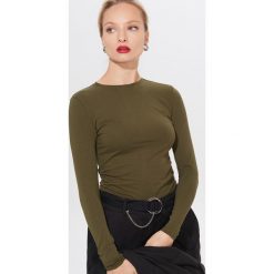 Bluzka z bawełny organicznej Eco Aware - Khaki. Brązowe bluzki damskie Mohito, s, bez wzorów, z bawełny, bez kołnierzyka, bez rękawów. Za 39,99 zł.