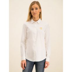 Koszula TOMMY HILFIGER Essential WW0WW25970. Białe bluzki damskie TOMMY HILFIGER, bez wzorów, z bawełny, bez kołnierzyka, bez rękawów. W wyprzedaży za 269,00 zł.