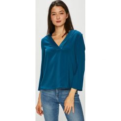 Vero Moda - Bluzka. Czarne bluzki damskie Vero Moda, s, bez wzorów, z elastanu, bez kołnierzyka, bez rękawów. W wyprzedaży za 69,90 zł.