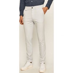Calvin Klein - Spodnie. Czarne spodnie męskie Calvin Klein, bez wzorów, z elastanu. Za 449,90 zł.