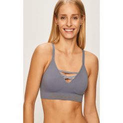Reebok - Biustonosz sportowy. Szare biustonosze sportowe damskie Reebok, s, bez wzorów, z elastanu. W wyprzedaży za 89,90 zł.