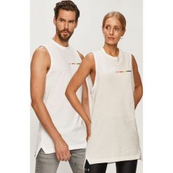 Reebok - Top. Białe topy damskie Reebok, s, bez wzorów, z bawełny, z okrągłym kołnierzem. W wyprzedaży za 89,90 zł.