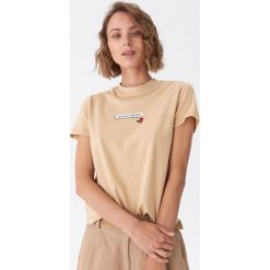 T-shirt z nadrukiem - Beżowy. Brązowe t-shirty damskie House, s, z nadrukiem, bez kołnierzyka. W wyprzedaży za 15,99 zł.