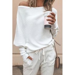 Bluzka damska GINNY WHITE. Białe bluzki damskie Bluzka damska GINNY WHITE, s, bez wzorów, bez kołnierzyka, bez rękawów. W wyprzedaży za 79,00 zł.