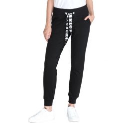 DKNY Spodnie dresowe Czarny. Czarne spodnie damskie DKNY, m, z elastanu, sportowe. Za 297,95 zł.