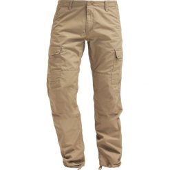 Carhartt WIP AVIATION COLUMBIA Bojówki khaki/light brown. Brązowe spodnie męskie marki Carhartt WIP, m, bez wzorów, z bawełny. Za 419,00 zł.