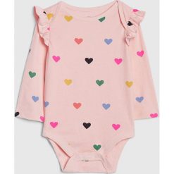 Body w kolorze jasnoróżowym ze wzorem. Różowe body niemowlęce Gap Kids, z nadrukiem, z bawełny, bez rękawów. W wyprzedaży za 22,95 zł.