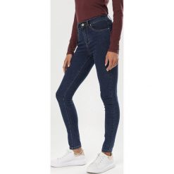 Granatowe Jeansy Skinny Thaneva. Niebieskie jeansy damskie Born2be. Za 69,99 zł.