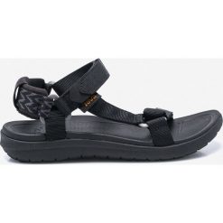 Teva - Sandały. Czarne klapki damskie Teva, bez wzorów, z materiału, bez obcasa, na obcasie. Za 279,90 zł.