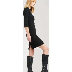 Czarna Sukienka Lose. Czarne sukienki dzianinowe marki other, l. Za 69,99 zł.