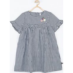 Coccodrillo - Sukienka dziecięca 92-122 cm. Czarne sukienki dziewczęce COCCODRILLO, bez wzorów, z tkaniny, casualowe, z krótkim rękawem, krótkie, mini, rozkloszowane. Za 89,90 zł.