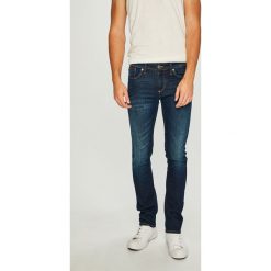 Tommy Jeans - Jeansy Scanton. Niebieskie jeansy męskie Tommy Jeans, bez wzorów, z obniżonym stanem. W wyprzedaży za 299,90 zł.