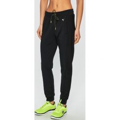 Puma - Spodnie. Czarne spodnie sportowe damskie marki Puma, s, z elastanu. Za 289,90 zł.