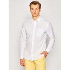 Koszula Tommy Jeans Blend DM0DM07924. Białe koszule męskie Tommy Jeans, m, bez wzorów, z bawełny, casualowe, bez kołnierzyka, bez rękawów. Za 339,00 zł.
