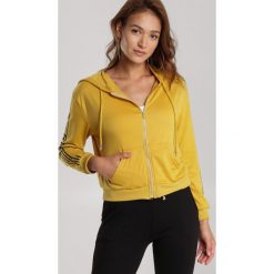 Żółta Bluza Rhenelaeno. Żółte bluzy damskie Renee, s, bez wzorów, bez rękawów, bez kaptura. Za 69,99 zł.