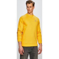 Dickies - Bluza. Żółte bluzy męskie Dickies, s, z nadrukiem, z bawełny, z okrągłym kołnierzem, bez rękawów, bez kaptura. W wyprzedaży za 139,90 zł.